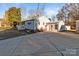 View of house and detached garage from the driveway at 120 Moyle Ave, Salisbury, NC 28146