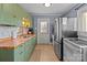 Galley style kitchen with stainless steel appliances and wood countertops at 120 Moyle Ave, Salisbury, NC 28146