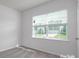 Bright bedroom with window and neutral decor at 132 Hayes Rd # 151, Kings Mountain, NC 28086