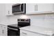 Stainless steel appliances and white shaker cabinets highlight this kitchen at 132 Hayes Rd # 151, Kings Mountain, NC 28086