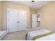 Bedroom with double doors leading to closet and access to hall at 13618 Pacific Echo Dr, Charlotte, NC 28277