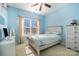 Light and airy bedroom with a double bed and dresser at 13618 Pacific Echo Dr, Charlotte, NC 28277