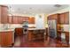 Kitchen boasts stainless steel appliances and an island with seating at 13618 Pacific Echo Dr, Charlotte, NC 28277