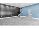 Spacious basement recreation area with wood accent wall at 140 Kent Rd, Salisbury, NC 28147