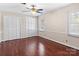 Hardwood floor bedroom with double closets and window at 140 Kent Rd, Salisbury, NC 28147