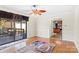 Bright dining room with hardwood floors and sliding glass doors leading to a deck at 140 Kent Rd, Salisbury, NC 28147