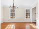 Bright dining room with hardwood floors and large windows at 140 Kent Rd, Salisbury, NC 28147