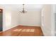 Formal dining room featuring hardwood floors and crown molding at 140 Kent Rd, Salisbury, NC 28147