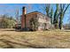 Brick home with mature trees and landscaping at 140 Kent Rd, Salisbury, NC 28147