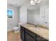 Bathroom boasts granite countertop vanity and tiled floor at 1409 Bicycle Ct, York, SC 29745