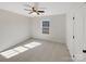 Bright bedroom with carpeted floors and a large window at 1409 Bicycle Ct, York, SC 29745