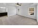 Main bedroom with carpet and ensuite bathroom access at 1409 Bicycle Ct, York, SC 29745