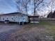 Ranch house with carport and fenced backyard at 1443 Modena St, Gastonia, NC 28054