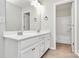 Bathroom featuring a double sink vanity and neutral color scheme at 14812 Baytown Ct, Huntersville, NC 28078