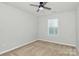 This is a bedroom showcasing a window with natural light and neutral walls at 14812 Baytown Ct, Huntersville, NC 28078