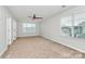 Spacious bedroom featuring large windows for ample natural light and a neutral color palette at 14812 Baytown Ct, Huntersville, NC 28078