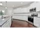 Modern kitchen equipped with stainless steel appliances and ample counter space at 14812 Baytown Ct, Huntersville, NC 28078