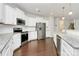 Contemporary kitchen with stainless steel appliances and a large island at 14812 Baytown Ct, Huntersville, NC 28078