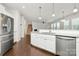 Open-concept kitchen with granite countertops and stainless steel refrigerator at 14812 Baytown Ct, Huntersville, NC 28078