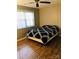 Bedroom with hardwood floors and ceiling fan at 1825 Herrin Ave, Charlotte, NC 28205