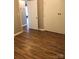 Bedroom with hardwood floors and double closets at 1825 Herrin Ave, Charlotte, NC 28205