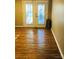 Dining area with hardwood floors and patio doors at 1825 Herrin Ave, Charlotte, NC 28205