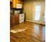 Kitchen with wood cabinets and laminate floors at 1825 Herrin Ave, Charlotte, NC 28205