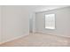 Bright bedroom featuring carpet, neutral walls, and closet at 2010 Durand Rd, Fort Mill, SC 29715