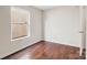 Simple bedroom with hardwood floors and a window at 2010 Durand Rd, Fort Mill, SC 29715