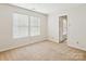 Well-lit bedroom with neutral walls and carpet at 2010 Durand Rd, Fort Mill, SC 29715