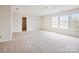 Large bedroom featuring three windows and carpeting at 2010 Durand Rd, Fort Mill, SC 29715