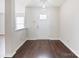 Bright entryway with hardwood floors and a white door leading into the home at 2010 Durand Rd, Fort Mill, SC 29715