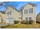 Tan two-story house with stone accents, a two-car garage, and a well-maintained lawn at 2010 Durand Rd, Fort Mill, SC 29715