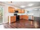 Kitchen with wood cabinets, stainless steel appliances, and hardwood floors at 2010 Durand Rd, Fort Mill, SC 29715