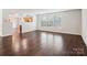 Spacious living room featuring hardwood floors and a view into the kitchen at 2010 Durand Rd, Fort Mill, SC 29715