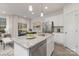 Spacious kitchen featuring granite island, stainless steel appliances, and white cabinetry at 2025 Tom Sadler Rd, Charlotte, NC 28214