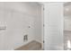 Laundry room with built-in shelving and a utility access at 2025 Tom Sadler Rd, Charlotte, NC 28214