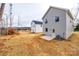 Gray house exterior with small patio and AC unit at 203 Benfield Rd, Kings Mountain, NC 28086