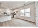 Modern kitchen with white cabinets, granite countertops, and stainless steel appliances at 203 Benfield Rd, Kings Mountain, NC 28086