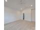 Bright bedroom with hardwood floors and access to bathroom at 2039 Renner St, Charlotte, NC 28216