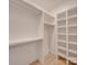 Large walk-in closet with hanging rods and shelving at 2039 Renner St, Charlotte, NC 28216