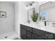 Double vanity bathroom with marble shower and modern fixtures at 2041 Greenoak Dr, Shelby, NC 28152