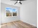 Bright bedroom with wood-look floors and large window at 2041 Greenoak Dr, Shelby, NC 28152