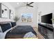 Main bedroom with high ceiling, hardwood floors, fireplace, and TV at 2041 Greenoak Dr, Shelby, NC 28152