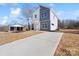 Two-story house with a long driveway and a partially visible neighboring structure at 2041 Greenoak Dr, Shelby, NC 28152