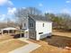 Modern two-story home with gray and white exterior at 2041 Greenoak Dr, Shelby, NC 28152