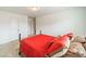 Cozy bedroom featuring a comfortable bed with red bedding at 2131 Ashley Glen Way, Indian Land, SC 29707