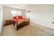 Charming bedroom with a wooden bed frame and nightstand at 2131 Ashley Glen Way, Fort Mill, SC 29707