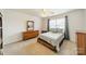 Bedroom with carpeted floor, dresser, and full-size bed at 2131 Ashley Glen Way, Fort Mill, SC 29707