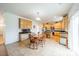 Eat-in kitchen with light wood cabinets, granite counters, and tile floor at 2131 Ashley Glen Way, Indian Land, SC 29707